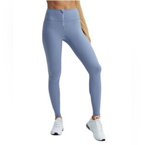 Fabletics High-Waisted Motion365® Legging With Zipper in faded Denim/Soft-White
